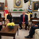 U.S. President Donald Trump speaks about banning non-tobacco flavored vaping products next to first lady Melania Trump as Health and Human Services (HHS) Secretary Alex Azar (R) and Acting Food and Drug Administration (FDA) Administrator Norman "Ned" Sharpless listen in the Oval Office of the White House in Washington, U.S., September 11, 2019.